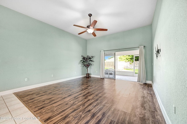 4040 Estancia Way, Melbourne, FL 32934 - empty room featuring a ceiling fan, wood finished floors, baseboards, and a textured wall