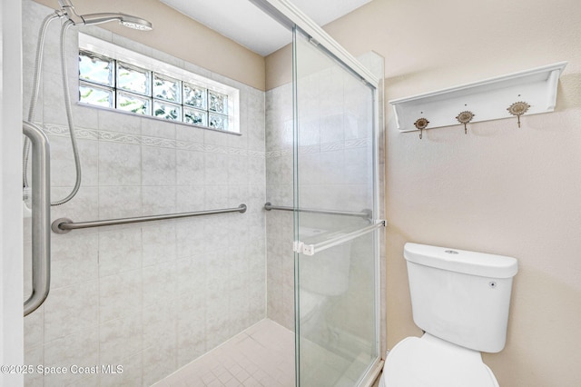 4040 Estancia Way, Melbourne, FL 32934 - full bathroom with a stall shower and toilet