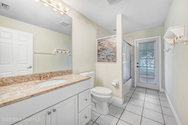 4040 Estancia Way, Melbourne, FL 32934 - bathroom featuring toilet, tile patterned flooring, vanity, baseboards, and combined bath / shower with glass door
