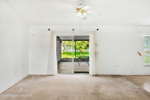 701 Agena Ave NW, Palm Bay, FL 32907 - empty room featuring ceiling fan, carpet, and baseboards