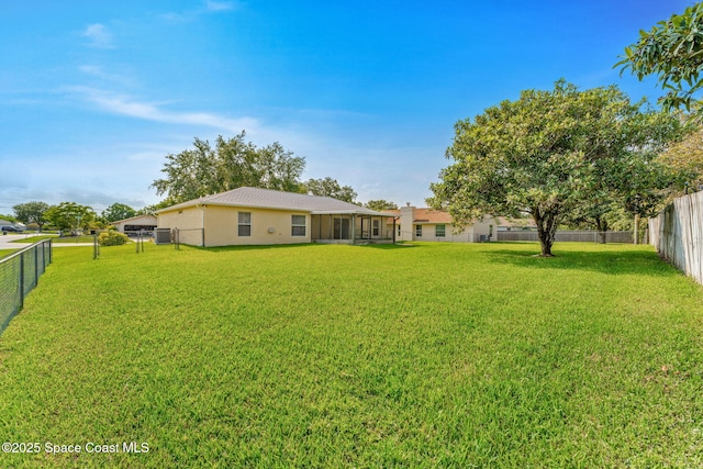701 Agena Ave NW, Palm Bay, FL 32907 - view of yard featuring a sunroom