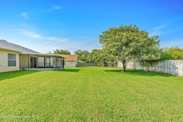701 Agena Ave NW, Palm Bay, FL 32907 - view of yard featuring a sunroom