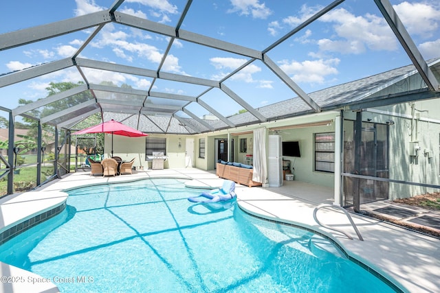 outdoor pool featuring an outdoor living space, a patio, and a lanai