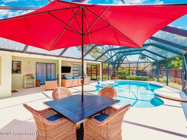 497 Erma Ct NE, Palm Bay, FL 32907 - outdoor pool with a fenced backyard, a patio, a lanai, and outdoor lounge area