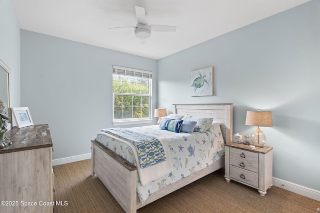 bedroom with baseboards, ceiling fan, and carpet flooring