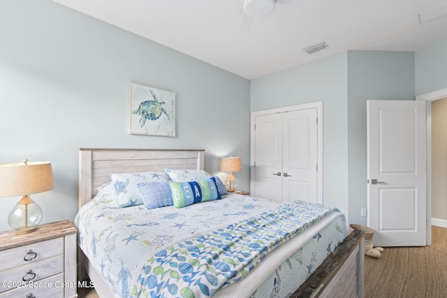 bedroom featuring carpet flooring, a closet, and ceiling fan