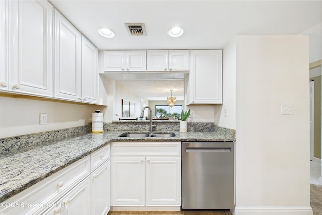 kitchen with dishwasher, a sink, white cabinets, light stone countertops, and recessed lighting