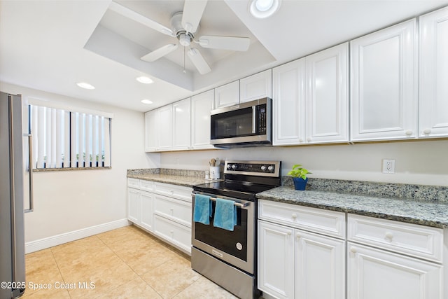 kitchen featuring appliances with stainless steel finishes, white cabinetry, and recessed lighting