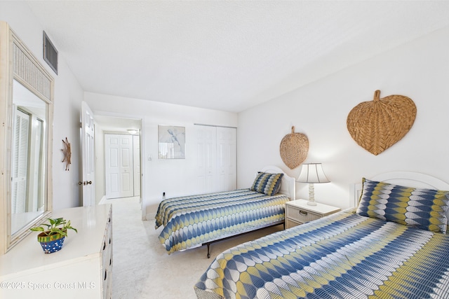 bedroom with a closet and baseboards