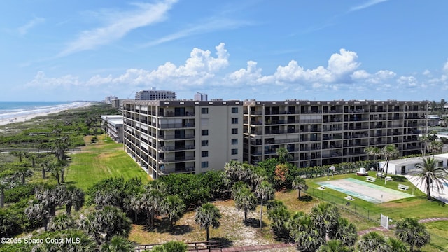 view of apartment building / complex featuring a water view