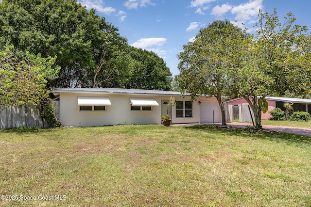 1751 5th Ct, Vero Beach, FL 32960 - view of front of house featuring concrete block siding and metal roof