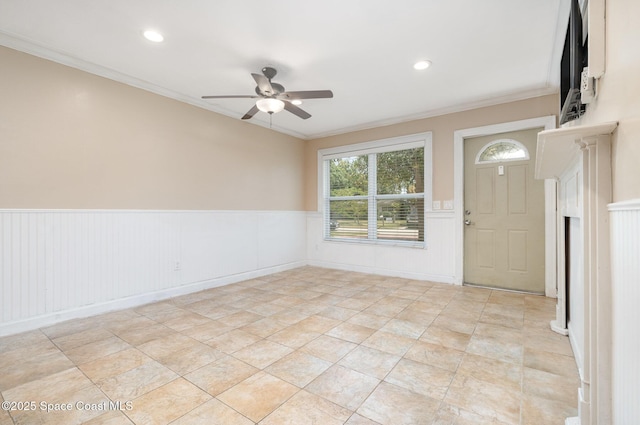 1751 5th Ct, Vero Beach, FL 32960 - foyer entrance with a ceiling fan, wainscoting, crown molding, and recessed lighting