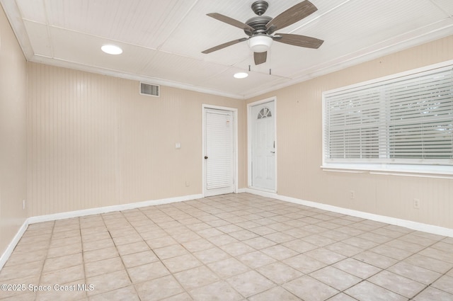 1751 5th Ct, Vero Beach, FL 32960 - empty room with recessed lighting, a ceiling fan, baseboards, wooden walls, and light tile patterned flooring