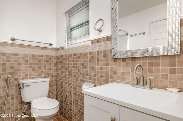 1751 5th Ct, Vero Beach, FL 32960 - bathroom with tile walls, toilet, and vanity