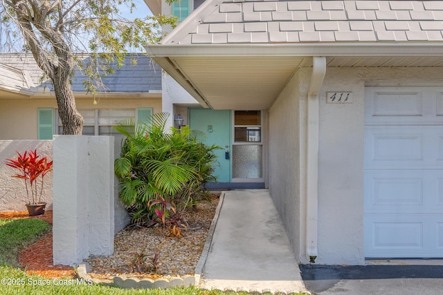 411 Dove Ln Unit 6-11, Satellite Beach, FL 32937 - doorway to property with stucco siding