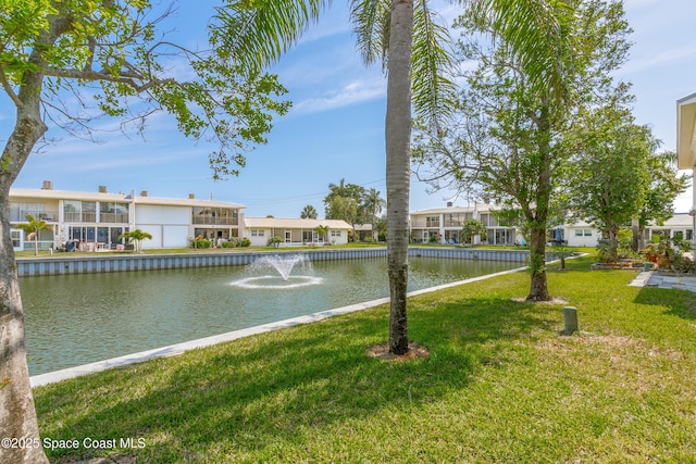 411 Dove Ln Unit 6-11, Satellite Beach, FL 32937 - water view featuring nearby suburban area