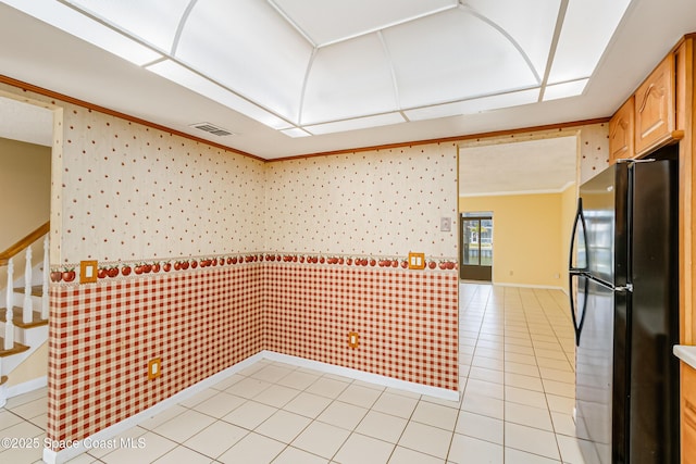 411 Dove Ln Unit 6-11, Satellite Beach, FL 32937 - empty room with wallpapered walls, wainscoting, baseboards, light tile patterned floors, and crown molding