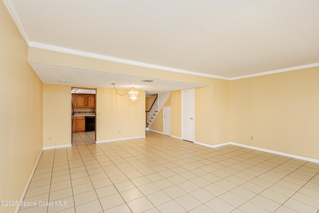 411 Dove Ln Unit 6-11, Satellite Beach, FL 32937 - spare room featuring stairs, crown molding, baseboards, light tile patterned floors, and a textured ceiling