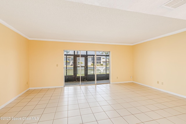 411 Dove Ln Unit 6-11, Satellite Beach, FL 32937 - unfurnished room with ornamental molding, baseboards, and light tile patterned floors