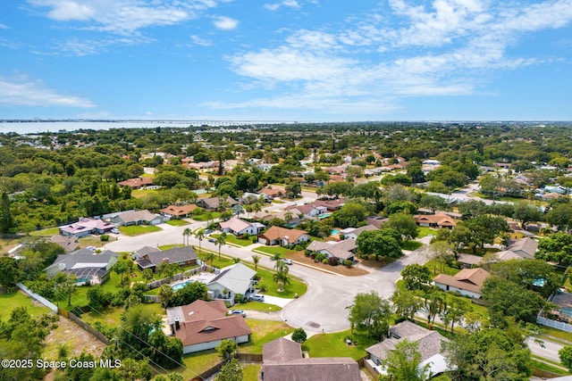 1875 Halifax Ave, Melbourne, FL 32935 - aerial perspective of suburban area featuring a nearby body of water