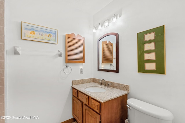 1875 Halifax Ave, Melbourne, FL 32935 - bathroom featuring toilet and vanity