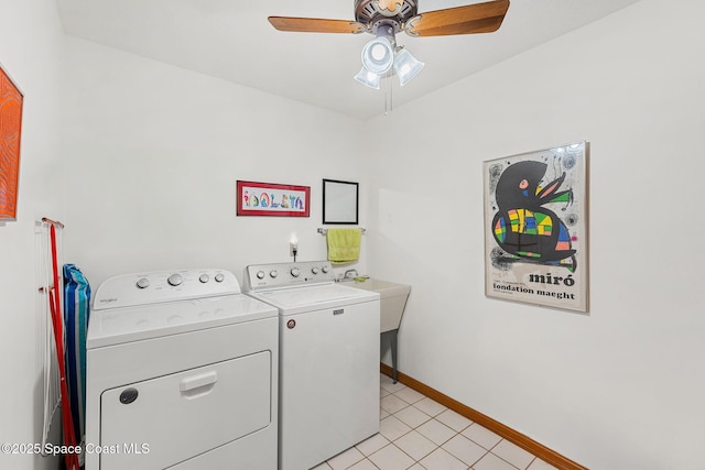 1875 Halifax Ave, Melbourne, FL 32935 - clothes washing area with separate washer and dryer, baseboards, a ceiling fan, and light tile patterned flooring
