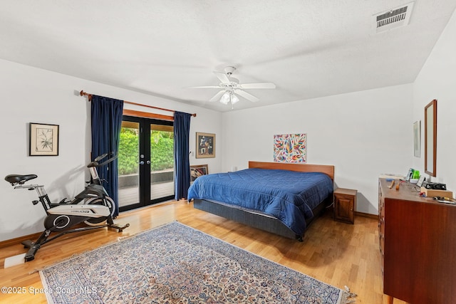 1875 Halifax Ave, Melbourne, FL 32935 - bedroom with access to outside, light wood-style flooring, french doors, and baseboards