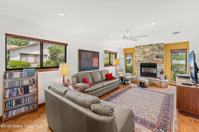 1875 Halifax Ave, Melbourne, FL 32935 - living area featuring ceiling fan, recessed lighting, a fireplace, and baseboards