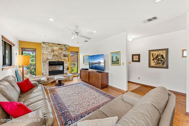 1875 Halifax Ave, Melbourne, FL 32935 - living room with a ceiling fan, recessed lighting, baseboards, and a stone fireplace
