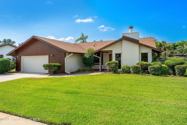 1875 Halifax Ave, Melbourne, FL 32935 - view of front of property featuring driveway, a garage, a front yard, a chimney, and a shingled roof