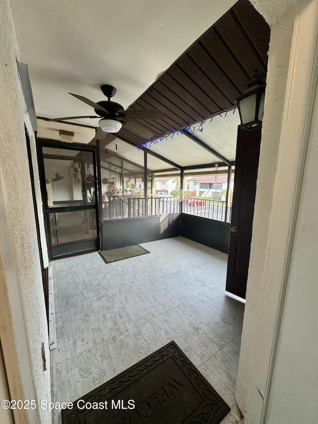 624 Ridge Club Dr Unit 86, Melbourne, FL 32934 - unfurnished sunroom featuring ceiling fan