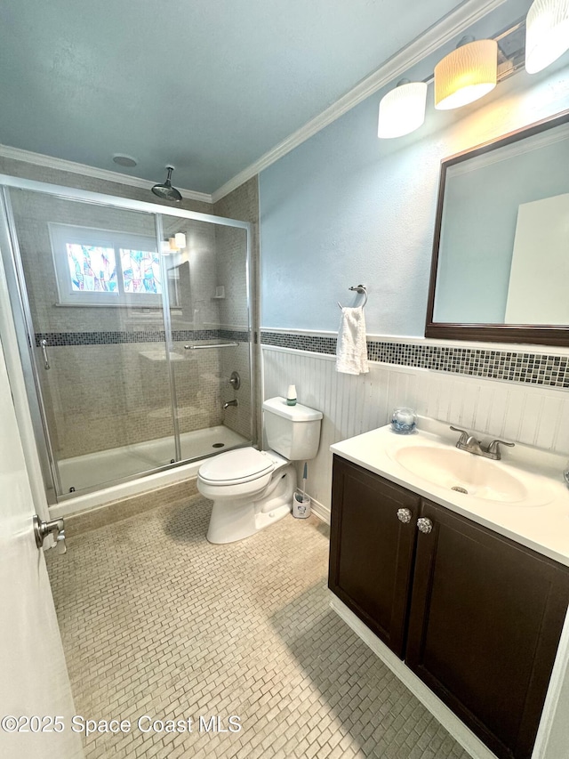 624 Ridge Club Dr Unit 86, Melbourne, FL 32934 - full bathroom featuring toilet, a shower stall, vanity, ornamental molding, and tile patterned flooring
