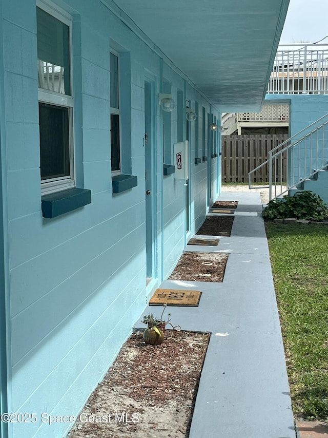 406 Tyler Ave Unit 4, Cape Canaveral, FL 32920 - view of side of home featuring a porch