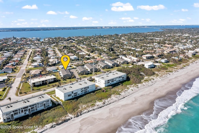 aerial view of residential area with extended coastline
