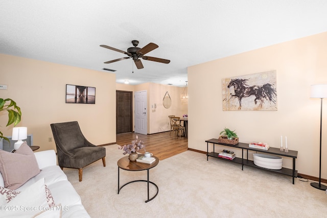 9020 Brighton Ct Unit 4-H, West Melbourne, FL 32904 - living area with ceiling fan, light carpet, and baseboards
