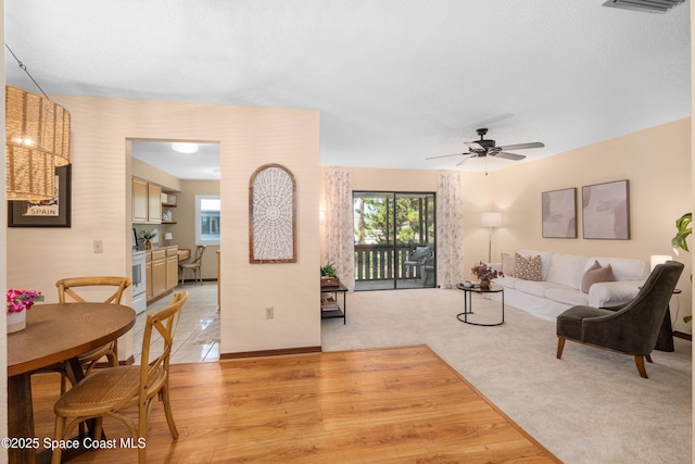 9020 Brighton Ct Unit 4-H, West Melbourne, FL 32904 - living room featuring a ceiling fan