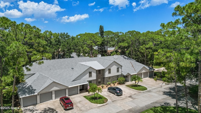 9020 Brighton Ct Unit 4-H, West Melbourne, FL 32904 - aerial view of property and surrounding area featuring a tree filled landscape