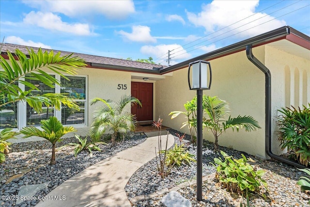 515 Hibiscus Trl, Melbourne Beach, FL 32951 - property entrance with stucco siding
