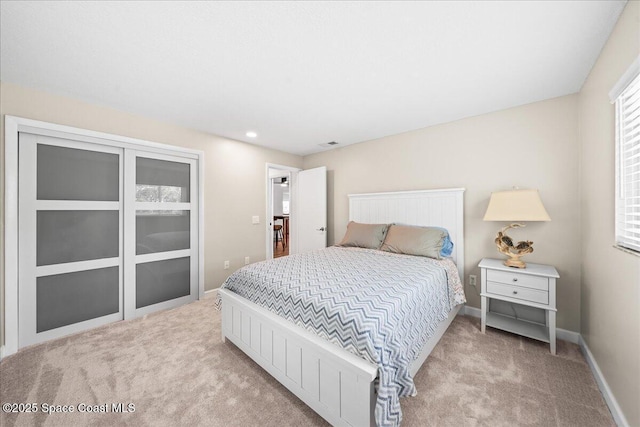 515 Hibiscus Trl, Melbourne Beach, FL 32951 - bedroom with light carpet and baseboards