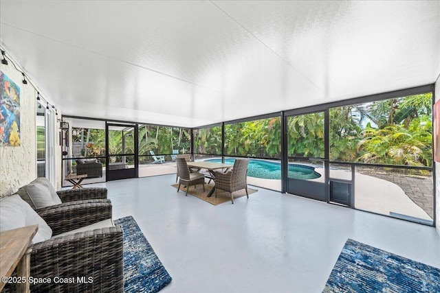 515 Hibiscus Trl, Melbourne Beach, FL 32951 - sunroom / solarium featuring finished concrete floors and a textured ceiling