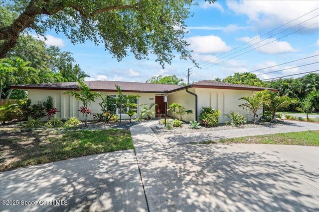 515 Hibiscus Trl, Melbourne Beach, FL 32951 - single story home featuring stucco siding