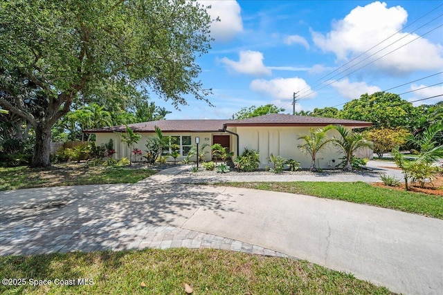 515 Hibiscus Trl, Melbourne Beach, FL 32951 - single story home with stucco siding