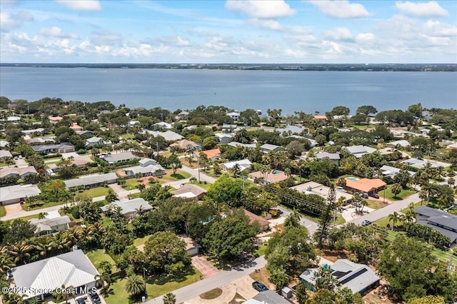 515 Hibiscus Trl, Melbourne Beach, FL 32951 - aerial perspective of suburban area featuring a nearby body of water