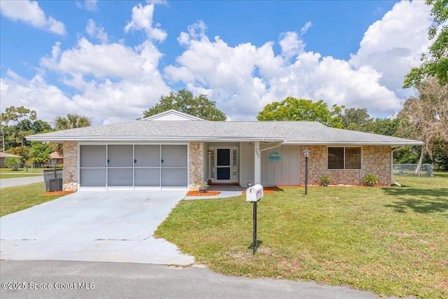 752 Samuel Chase Ln, West Melbourne, FL 32904 - ranch-style house with stone siding, a garage, driveway, and a front yard