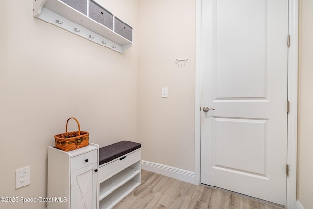 2602 Flintstone Ave SE, Palm Bay, FL 32909 - mudroom featuring light wood-type flooring and baseboards