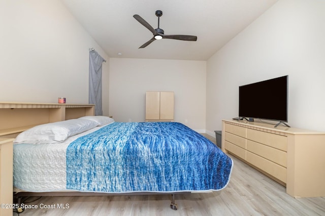 2602 Flintstone Ave SE, Palm Bay, FL 32909 - bedroom with light wood-type flooring and ceiling fan