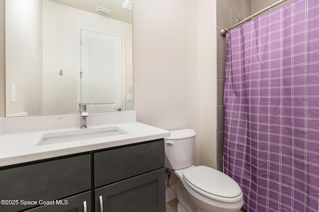 2602 Flintstone Ave SE, Palm Bay, FL 32909 - bathroom featuring toilet, vanity, and curtained shower