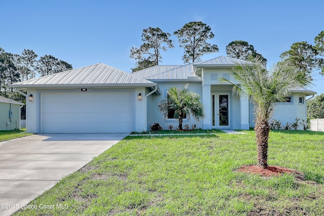 926 Sareta St SE, Palm Bay, FL 32909 - view of front of house featuring an attached garage, driveway, stucco siding, and a front lawn