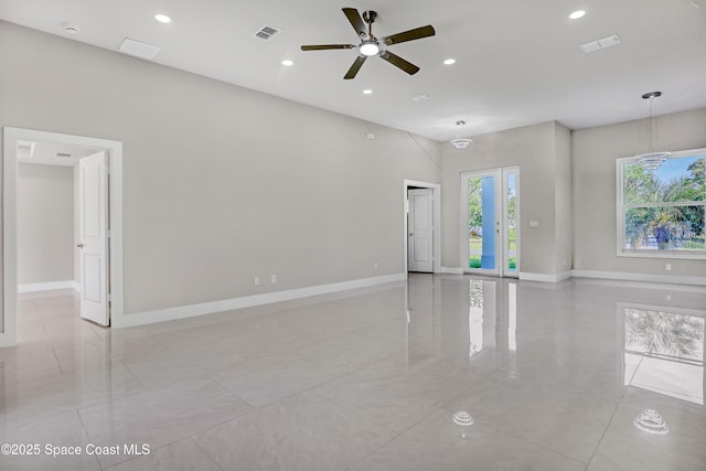 926 Sareta St SE, Palm Bay, FL 32909 - empty room featuring ceiling fan, baseboards, recessed lighting, light tile patterned floors, and a smoke detector