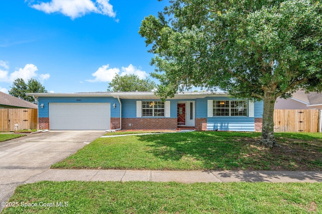 3845 Spring Creek Ln, Titusville, FL 32780 - ranch-style house with brick siding, an attached garage, and concrete driveway